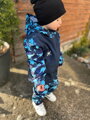 Chlapčenské softshellové nohavice s fleecom, Dinosaury na modrej 